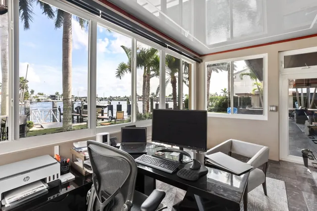 a front view of house with yard outdoor seating and green space