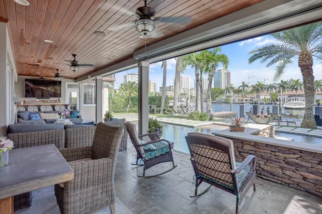 a view of balcony with palm trees
