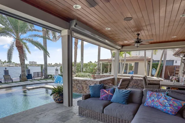 a view of swimming pool with chairs
