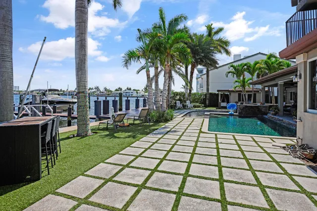 a view of a house with swimming pool