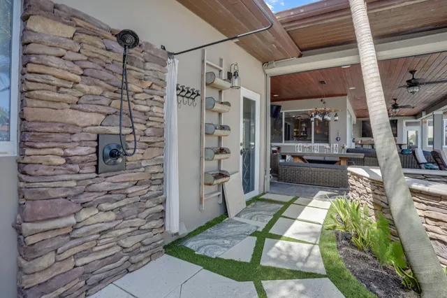 a view of a balcony with furniture