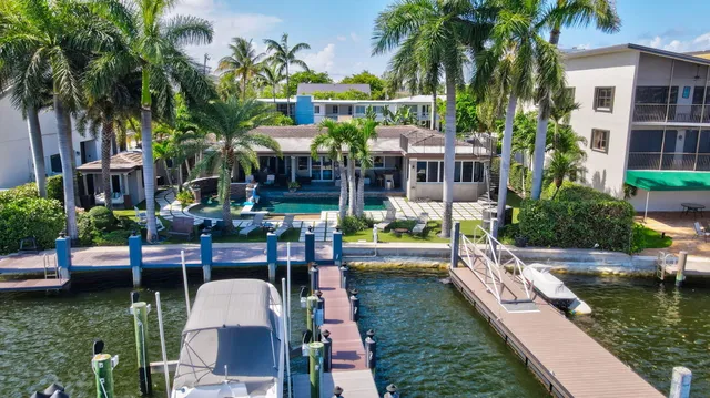 a utility room with sink dryer and washer