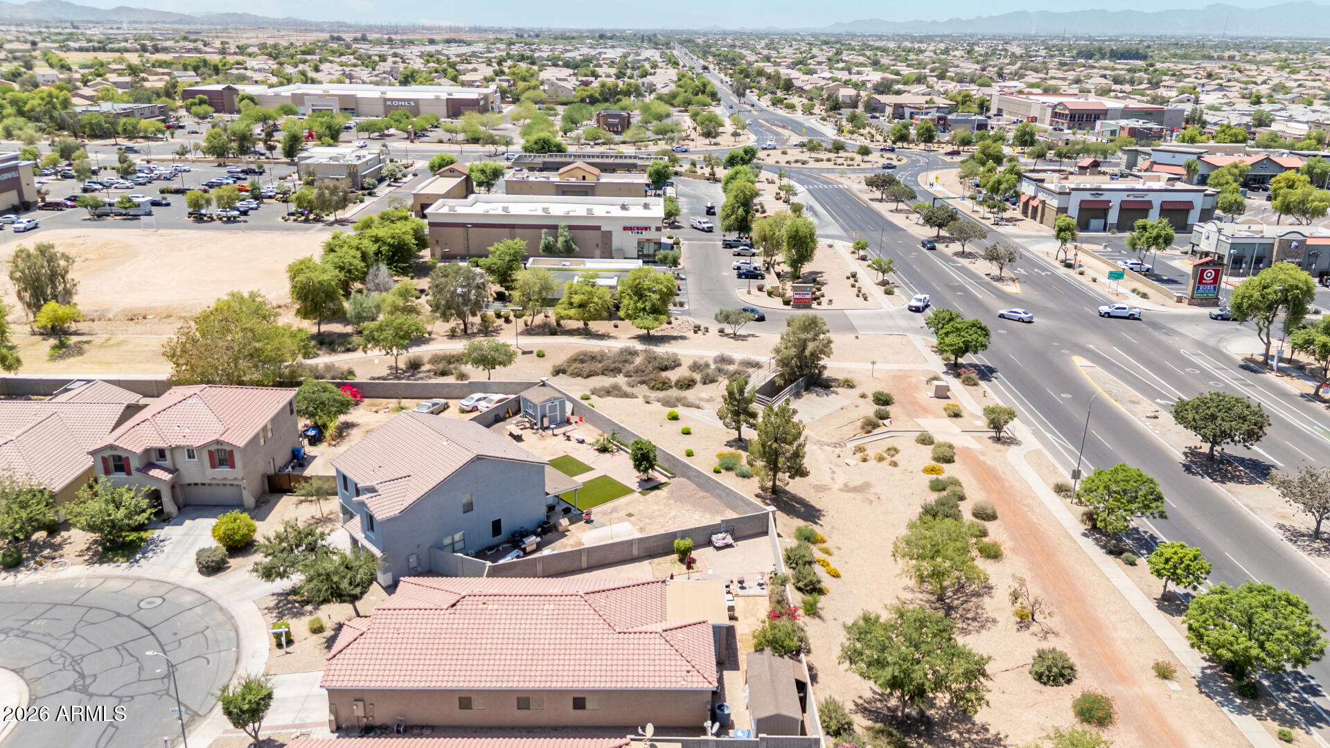 9730 West Payson Road Tolleson, AZ 85353 - Photo 45 of 57 an aerial view of residential houses with outdoor space