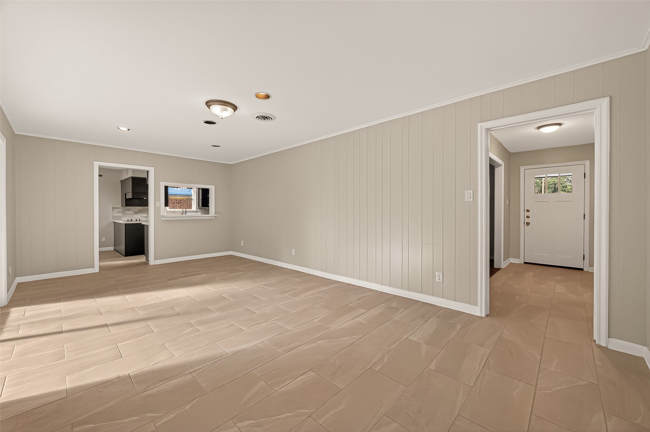 5211 Hummingbird Street Houston, TX 77035 - Photo 15 of 48 an empty room with a empty space and windows