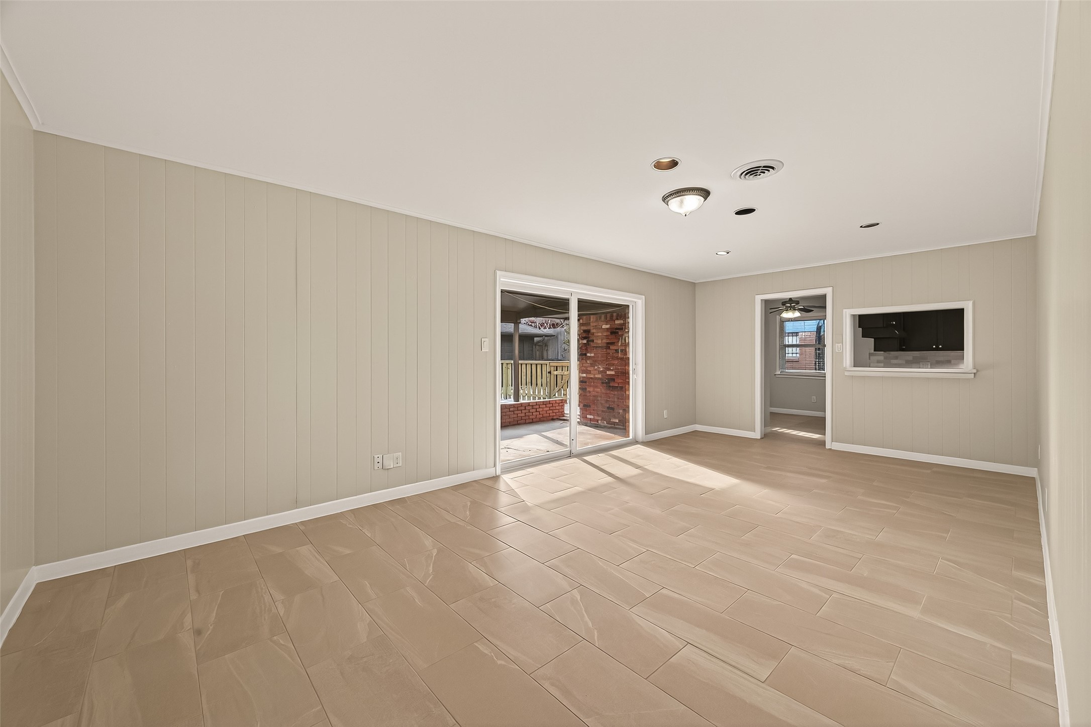 5211 Hummingbird Street Houston, TX 77035 - Photo 16 of 48 a view of an empty room with a window