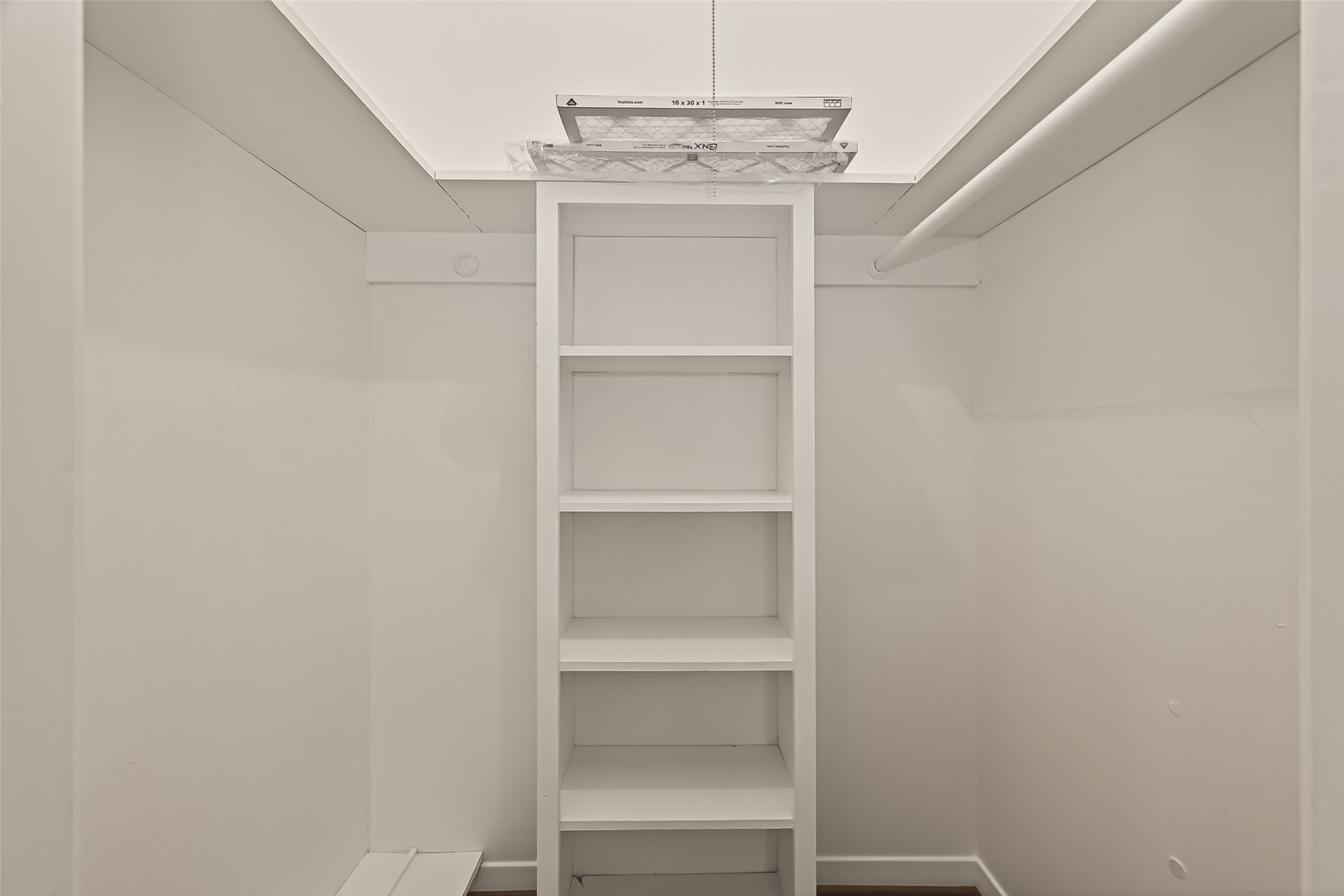 5211 Hummingbird Street Houston, TX 77035 - Photo 34 of 48 a view of an empty walk in closet