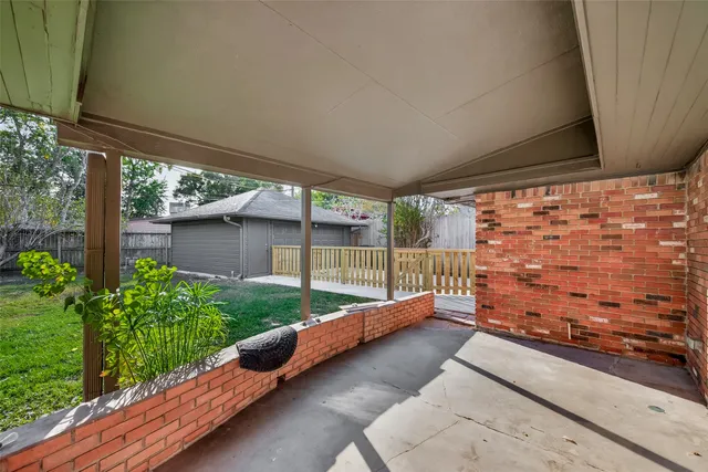a view of a backyard with garden