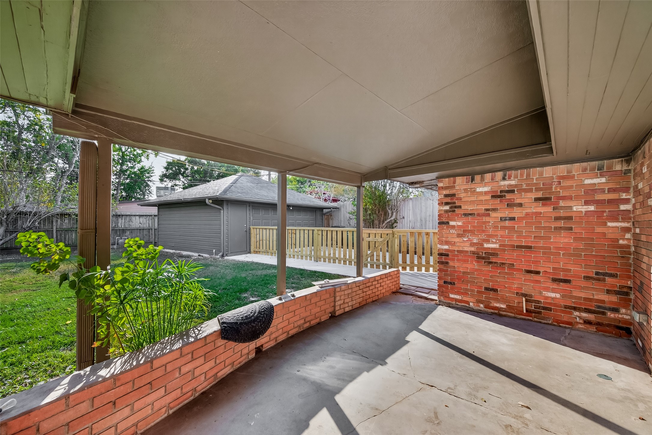 5211 Hummingbird Street Houston, TX 77035 - Photo 42 of 48 a view of a backyard with garden