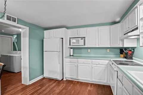 a view of utility room with washer and dryer