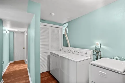 a view of hallway with washer and dryer