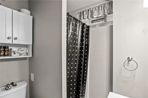 a view of a kitchen with furniture and cabinet