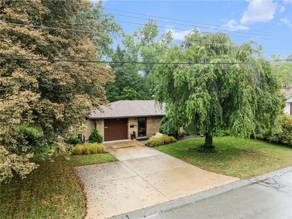 a living room with washer and dryer