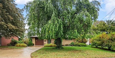 a view of roof deck with patio