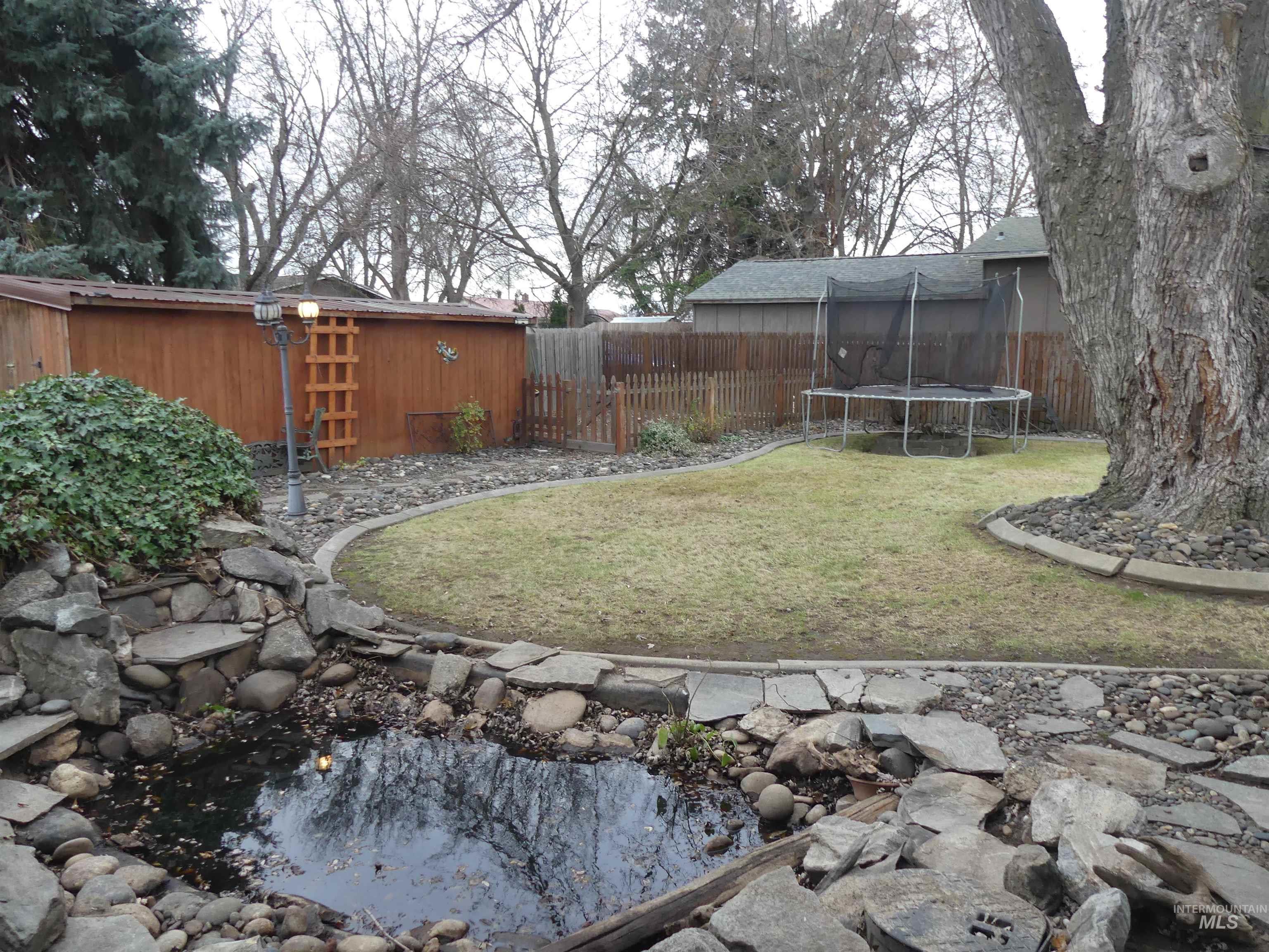 3427 18th Street Lewiston, ID 83501 - Photo 16 of 45 Fenced backyard with a trampoline