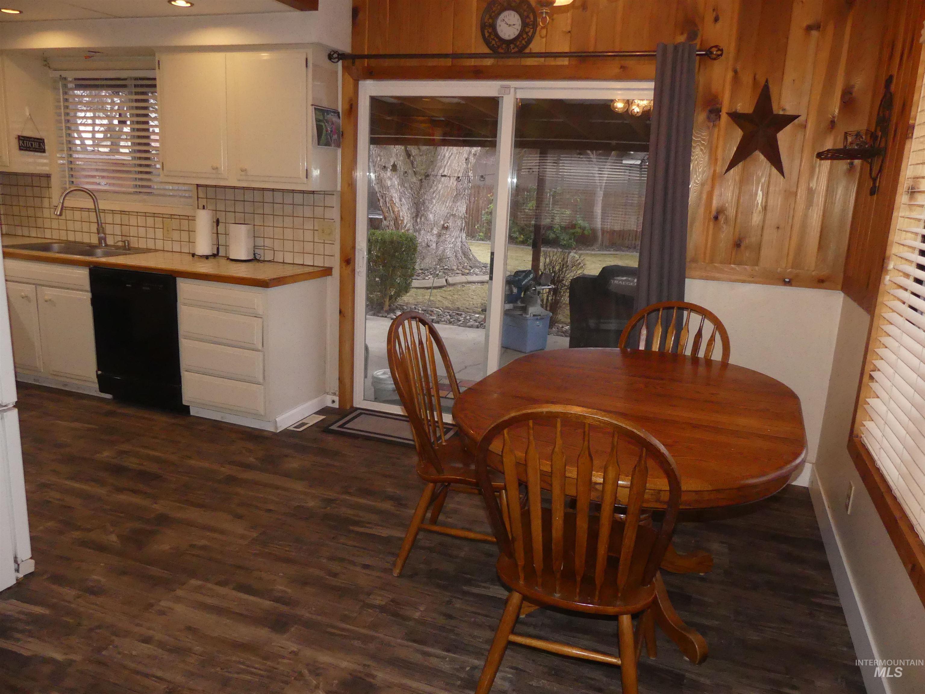 3427 18th Street Lewiston, ID 83501 - Photo 18 of 45 Dining area featuring dark wood finished floors