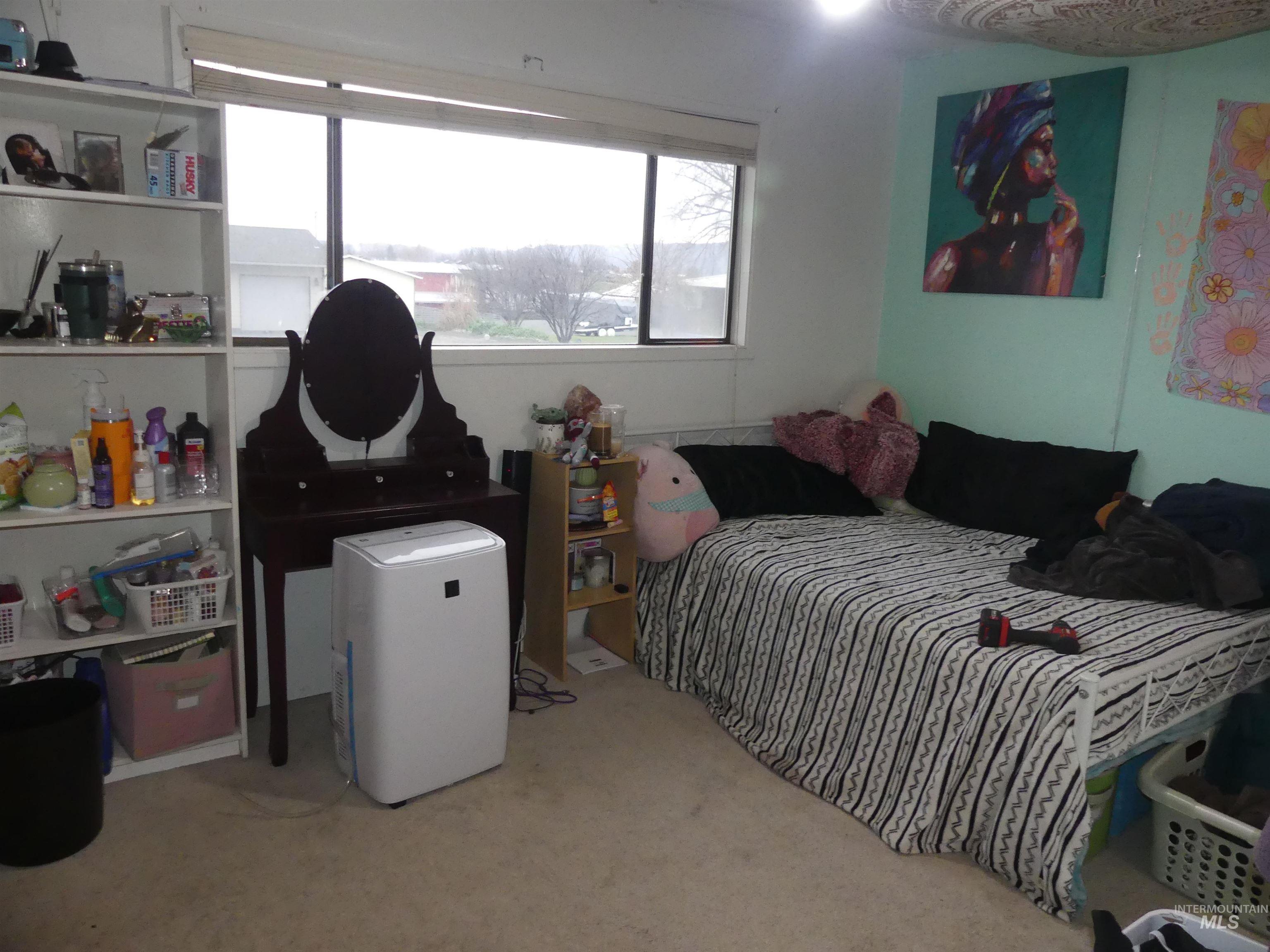 3427 18th Street Lewiston, ID 83501 - Photo 31 of 45 Bedroom featuring light colored carpet