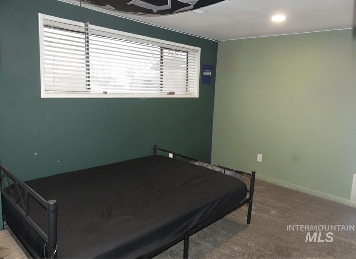 3427 18th Street Lewiston, ID 83501 - Photo 44 of 45 Carpeted bedroom with a ceiling fan