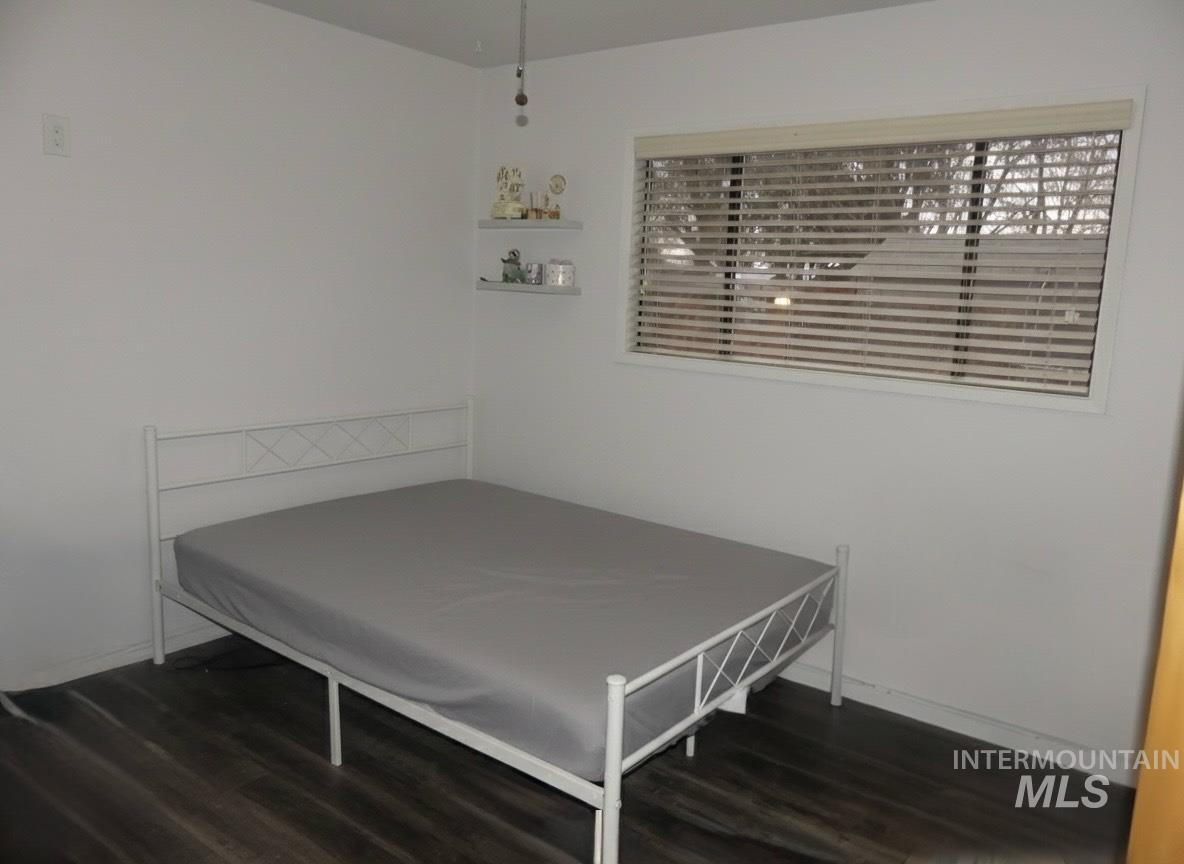 3427 18th Street Lewiston, ID 83501 - Photo 45 of 45 Bedroom with dark wood-style flooring