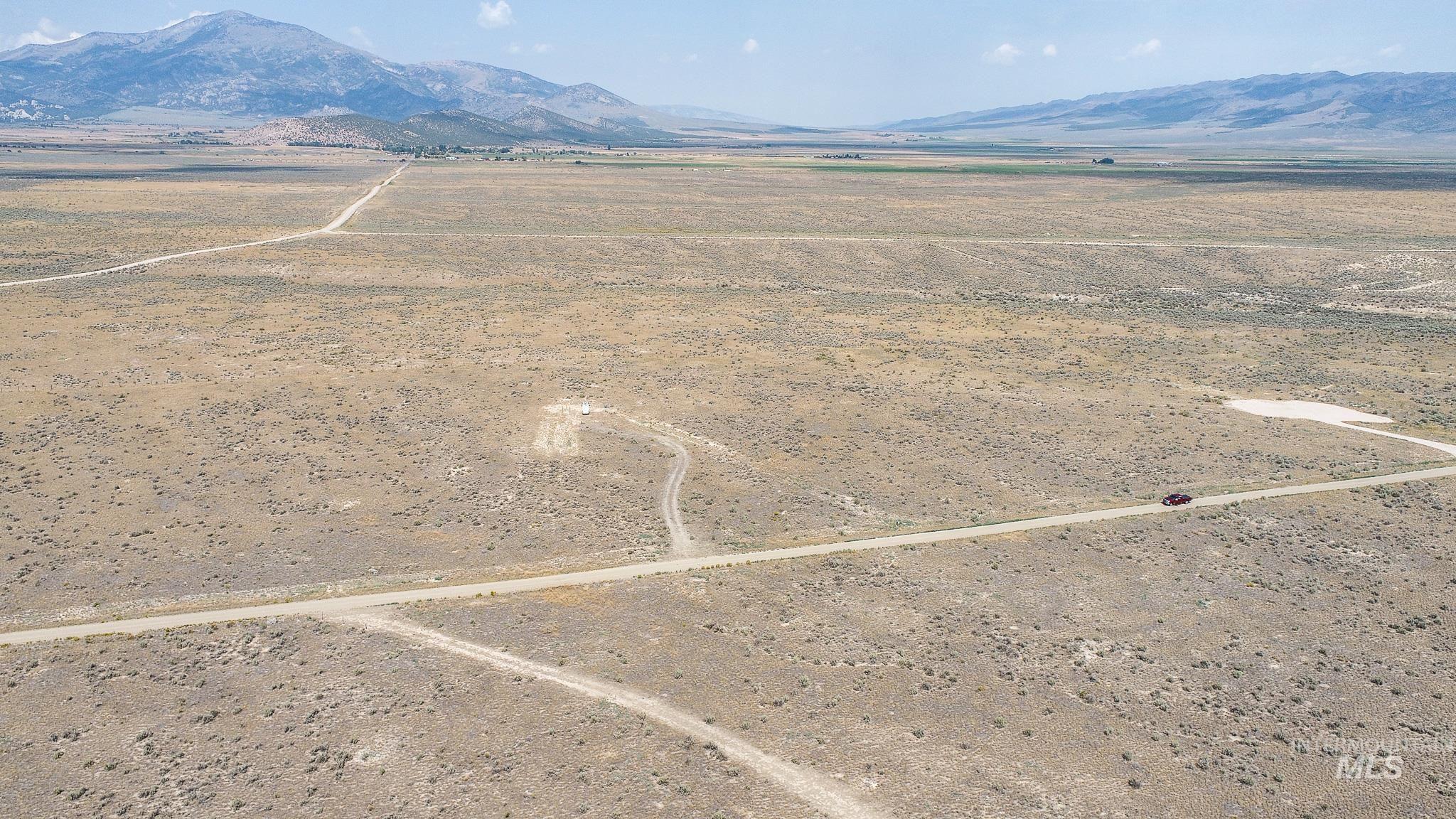 Tbd East Shooting Iron Road Almo, ID 83312 - Photo 11 of 14 Aerial view of sparsely populated area with a mountain backdrop