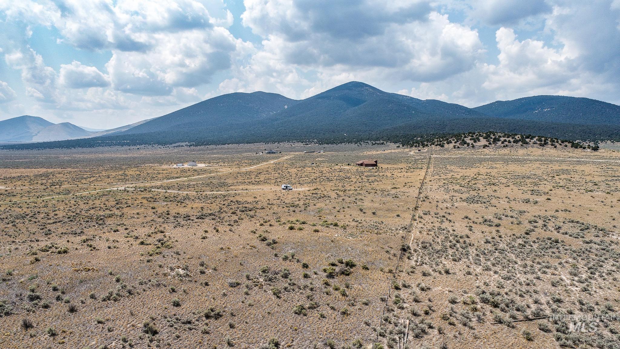 Tbd East Shooting Iron Road Almo, ID 83312 - Photo 5 of 14 Mountain view with rural landscape and a desert landscape