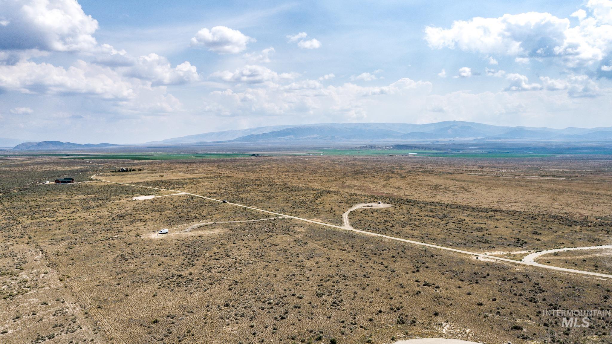 Tbd East Shooting Iron Road Almo, ID 83312 - Photo 7 of 14 Overview of rural landscape featuring a mountainous background and a desert landscape