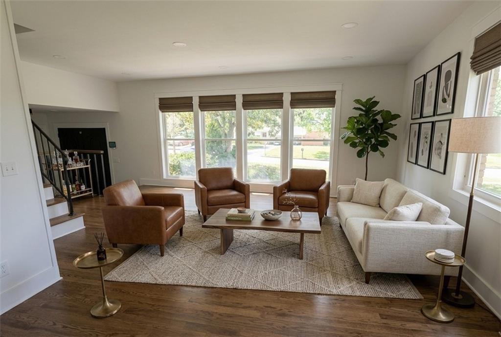 3763 Elkridge Drive Decatur, GA 30032 - Photo 12 of 20 a living room with furniture wooden floor and a large window