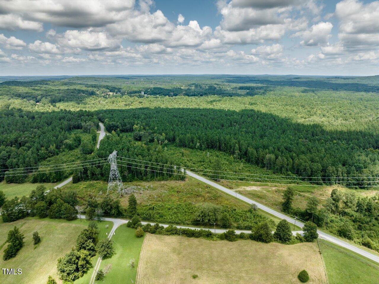 Tract B Chicken Bridge Road Pittsboro, NC 27312 - Photo 9 of 13 a view of a golf course with a lake