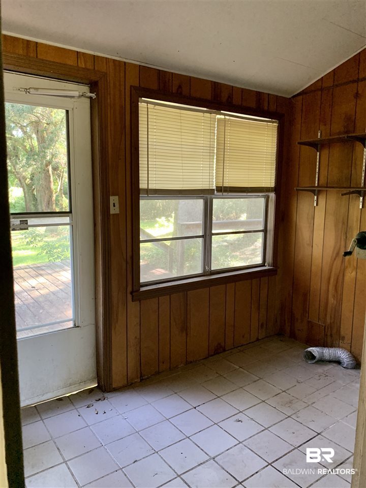 17071 County Road 52 Silverhill, AL 36576 - Photo 25 of 44 Large Laundry Room that Leads to Deck