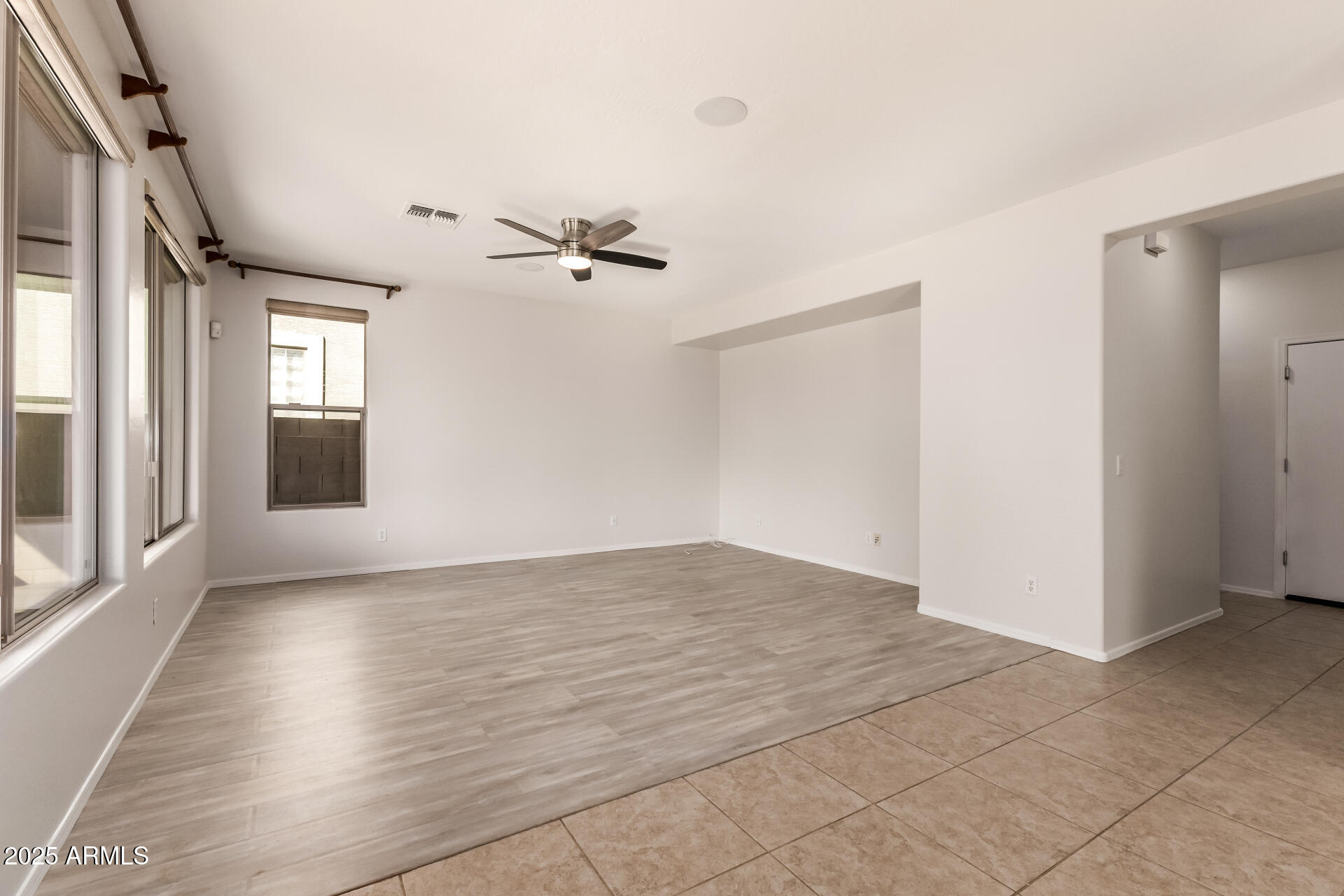 35822 North 33rd Lane Phoenix, AZ 85086 - Photo 11 of 54 a view of an empty room with a window