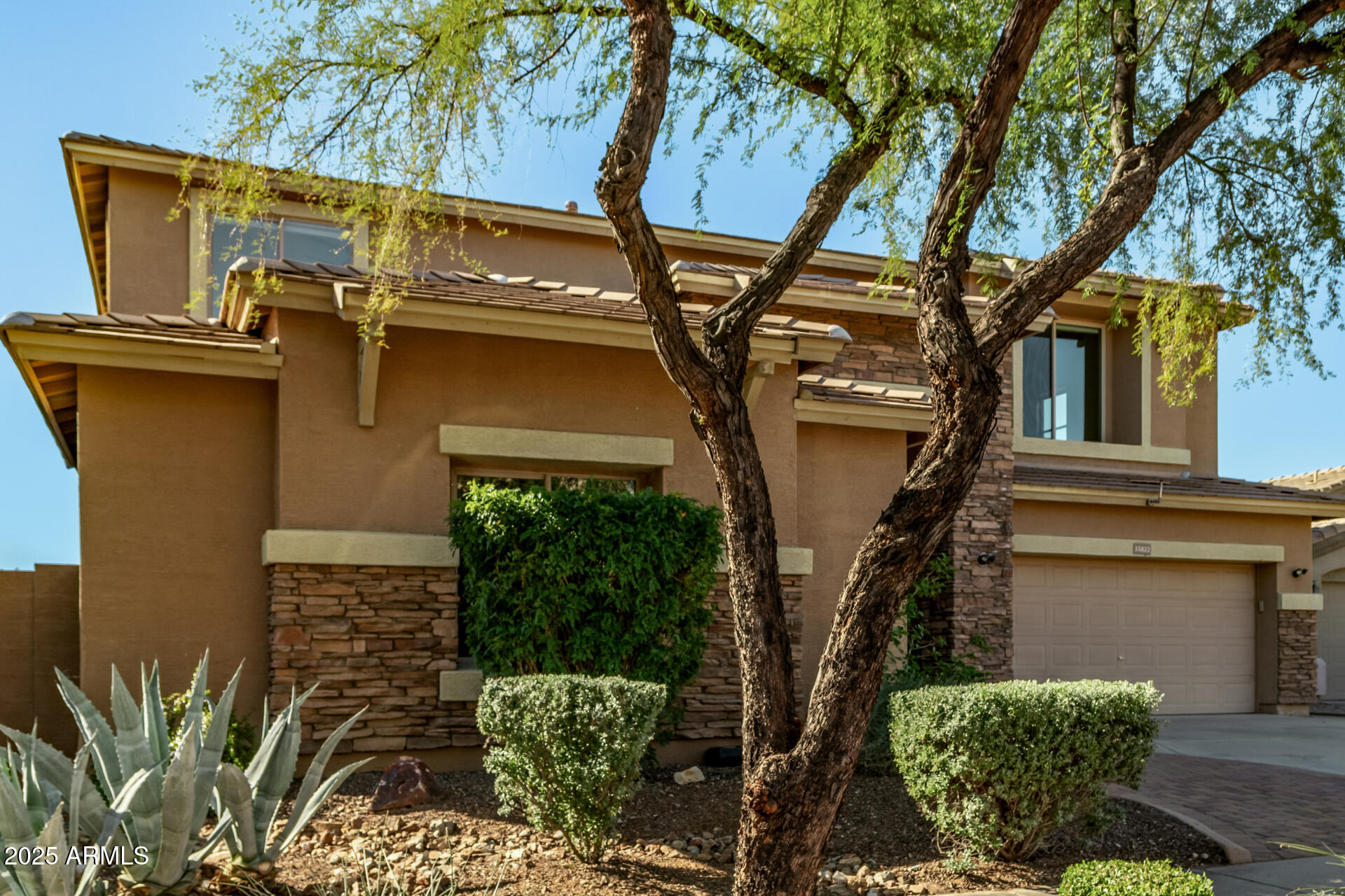 35822 North 33rd Lane Phoenix, AZ 85086 - Photo 2 of 54 a view of a house with a tree