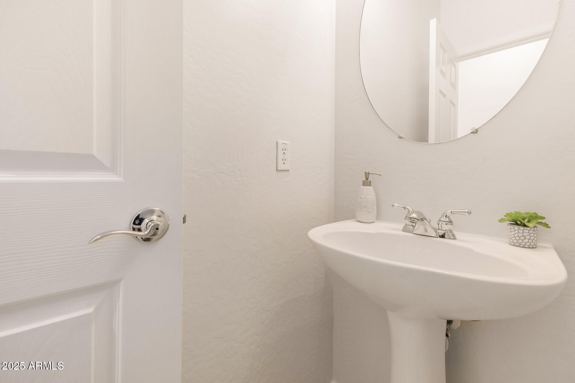 35822 North 33rd Lane Phoenix, AZ 85086 - Photo 24 of 54 a bathroom with a sink and mirror