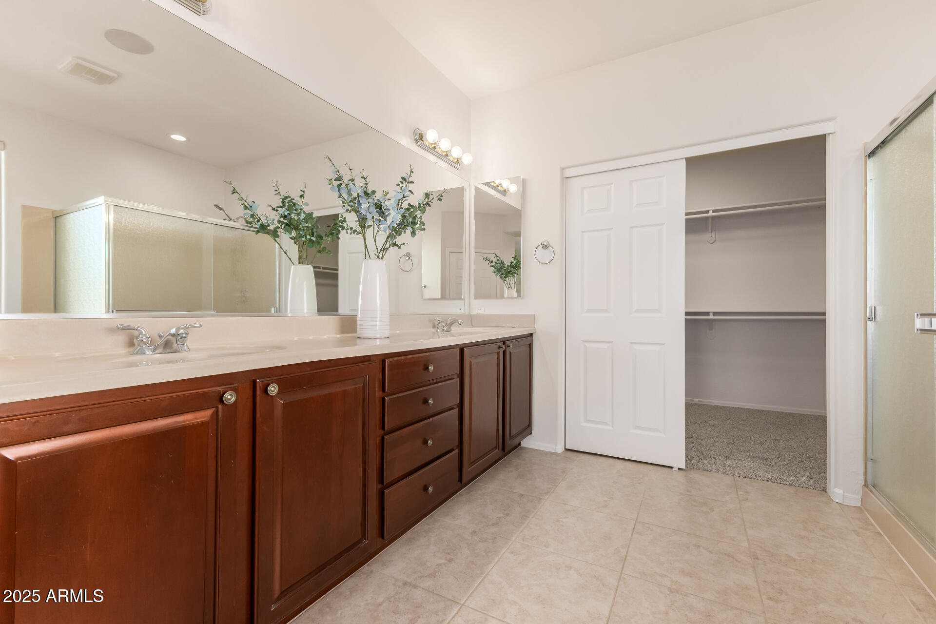 35822 North 33rd Lane Phoenix, AZ 85086 - Photo 28 of 54 a spacious bathroom with a granite countertop sink mirror and a shower