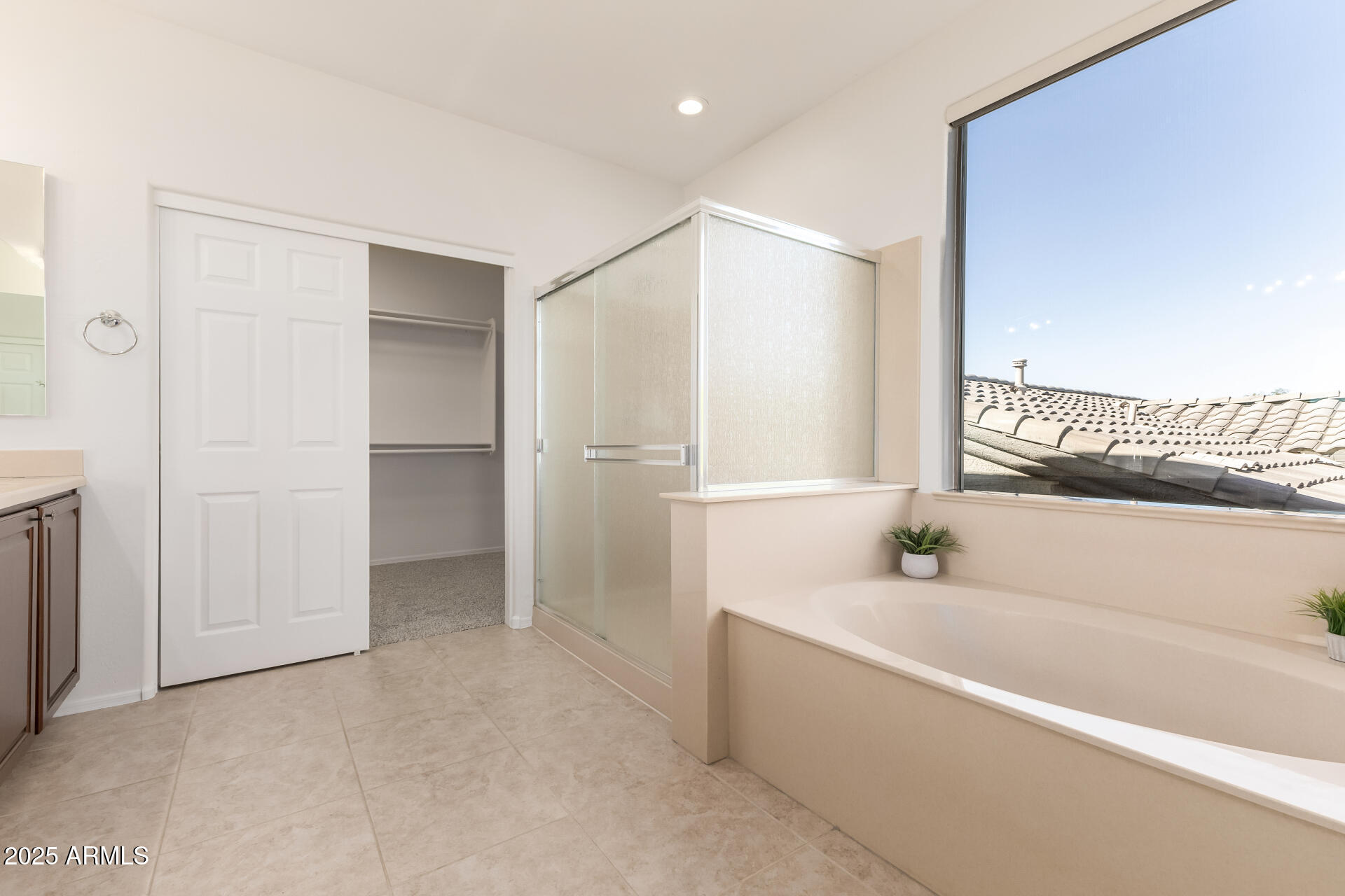 35822 North 33rd Lane Phoenix, AZ 85086 - Photo 29 of 54 a bathroom with a bathtub and a shower