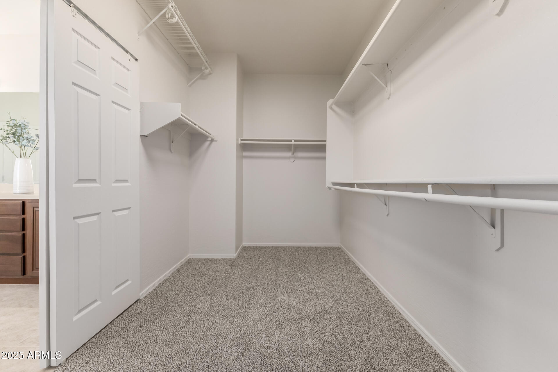 35822 North 33rd Lane Phoenix, AZ 85086 - Photo 30 of 54 a view of an empty walk in closet