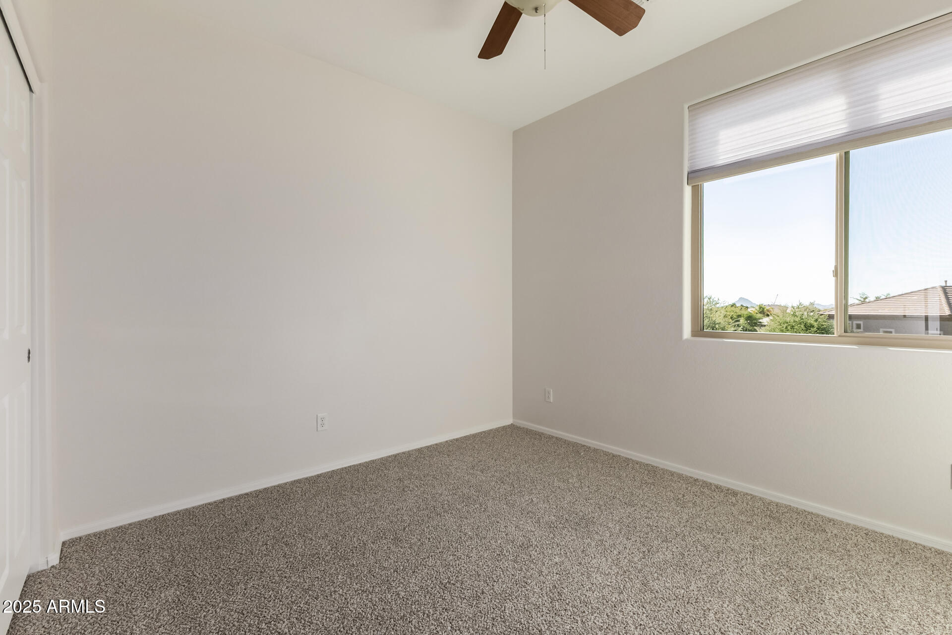 35822 North 33rd Lane Phoenix, AZ 85086 - Photo 33 of 54 an empty room with a window