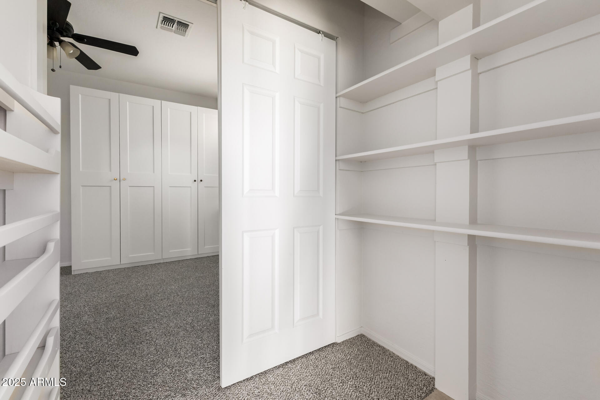 35822 North 33rd Lane Phoenix, AZ 85086 - Photo 38 of 54 a view of an empty walk in closet