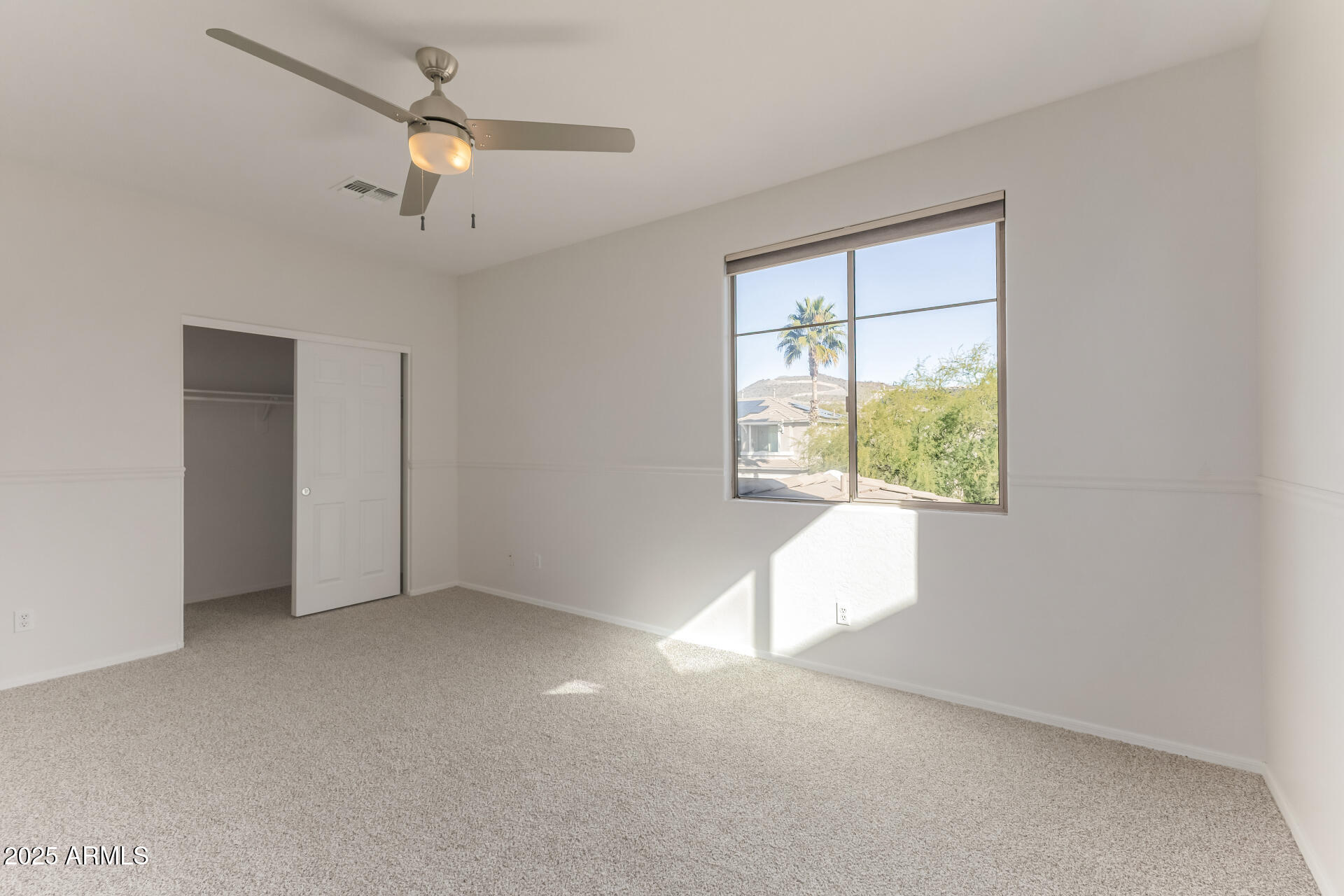 35822 North 33rd Lane Phoenix, AZ 85086 - Photo 40 of 54 an empty room with a window