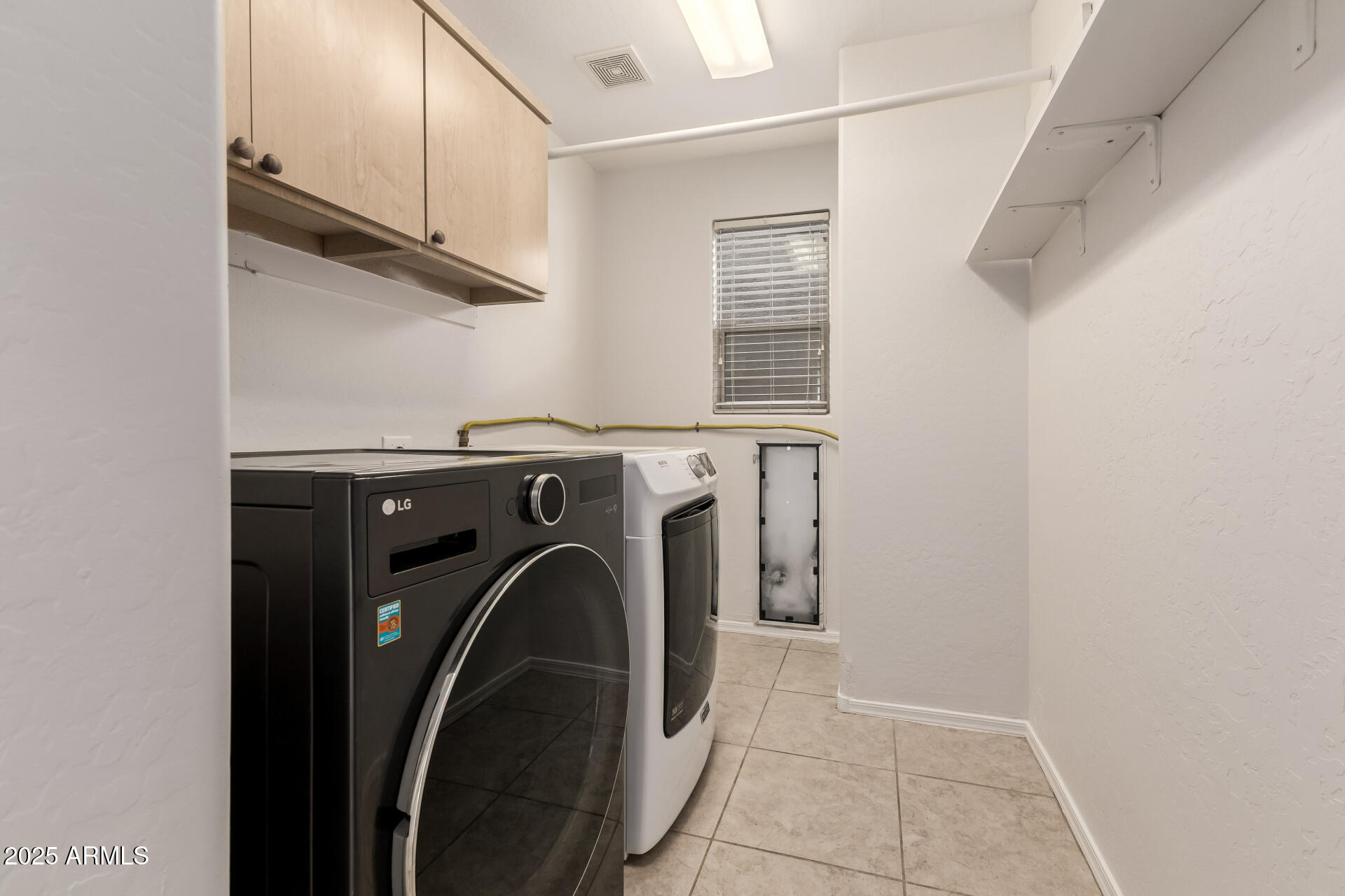 35822 North 33rd Lane Phoenix, AZ 85086 - Photo 46 of 54 a utility room with dryer and washer