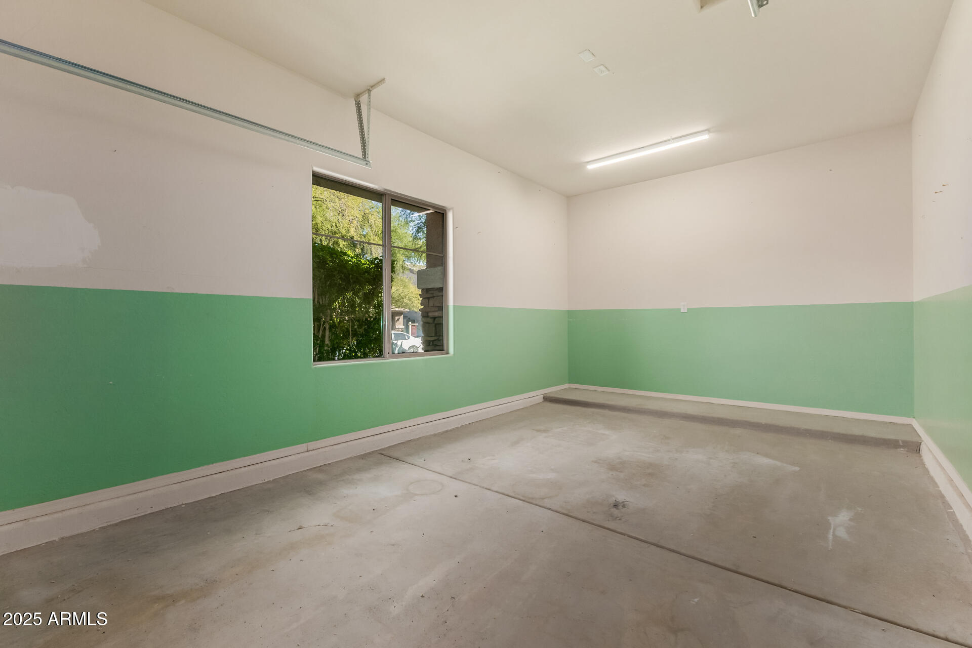35822 North 33rd Lane Phoenix, AZ 85086 - Photo 47 of 54 an empty room with a window and a ceiling fan