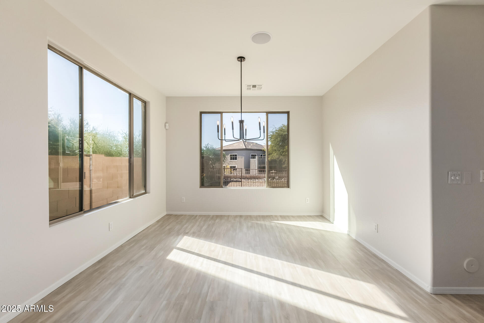 35822 North 33rd Lane Phoenix, AZ 85086 - Photo 8 of 54 a view of an empty room with a window