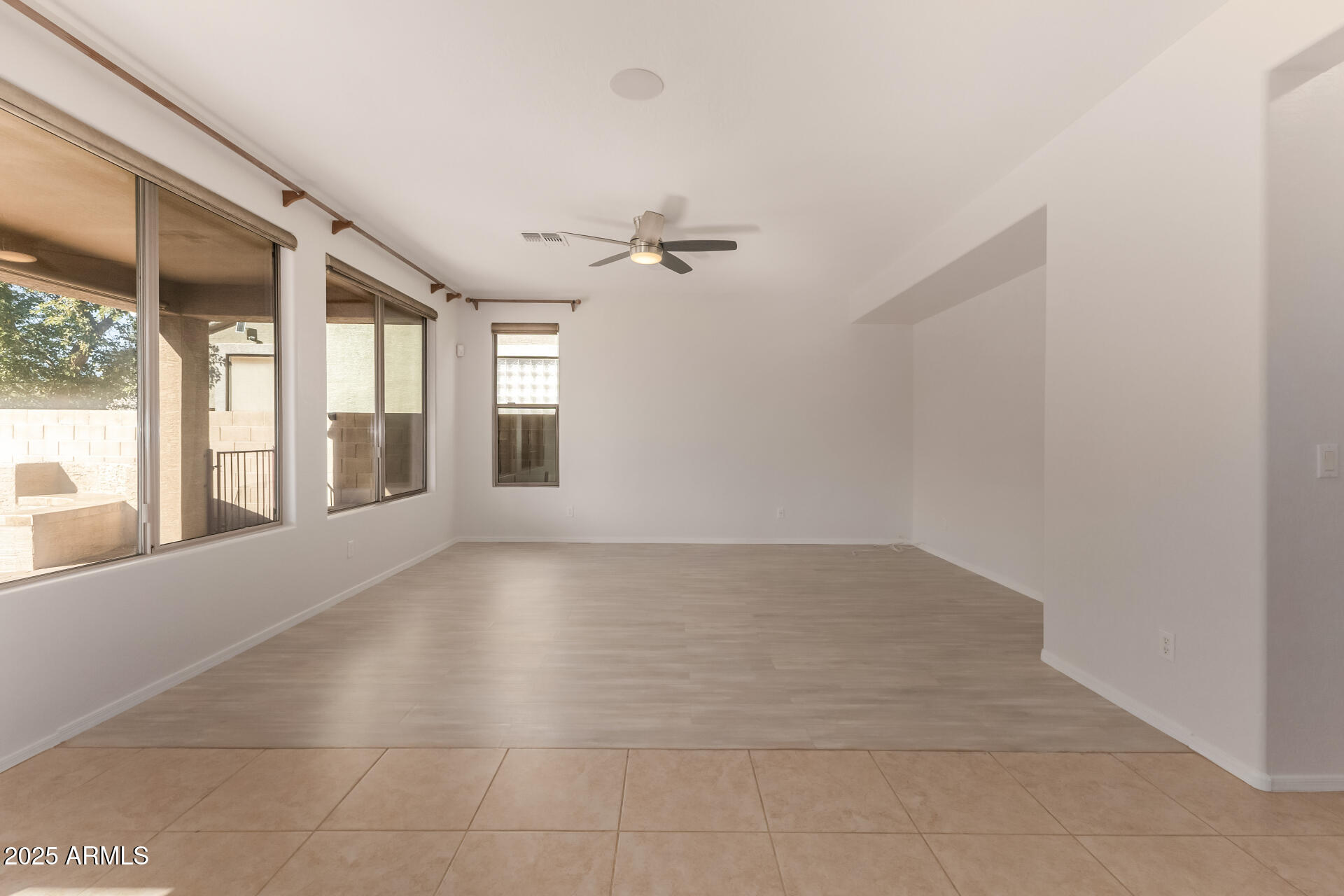 35822 North 33rd Lane Phoenix, AZ 85086 - Photo 10 of 54 a view of an empty room with a window