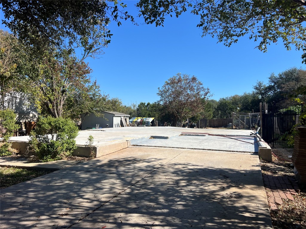 a view of a yard with an outdoor space