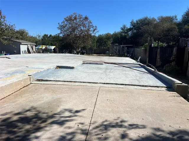a view of swimming pool with a yard
