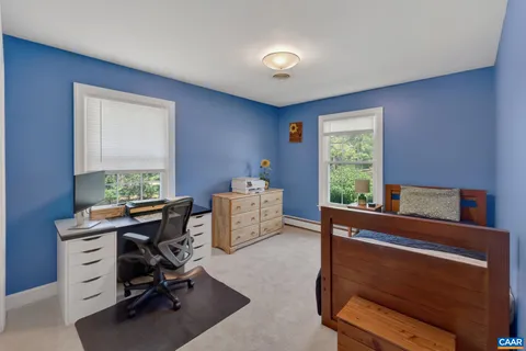 a room with furniture and a window