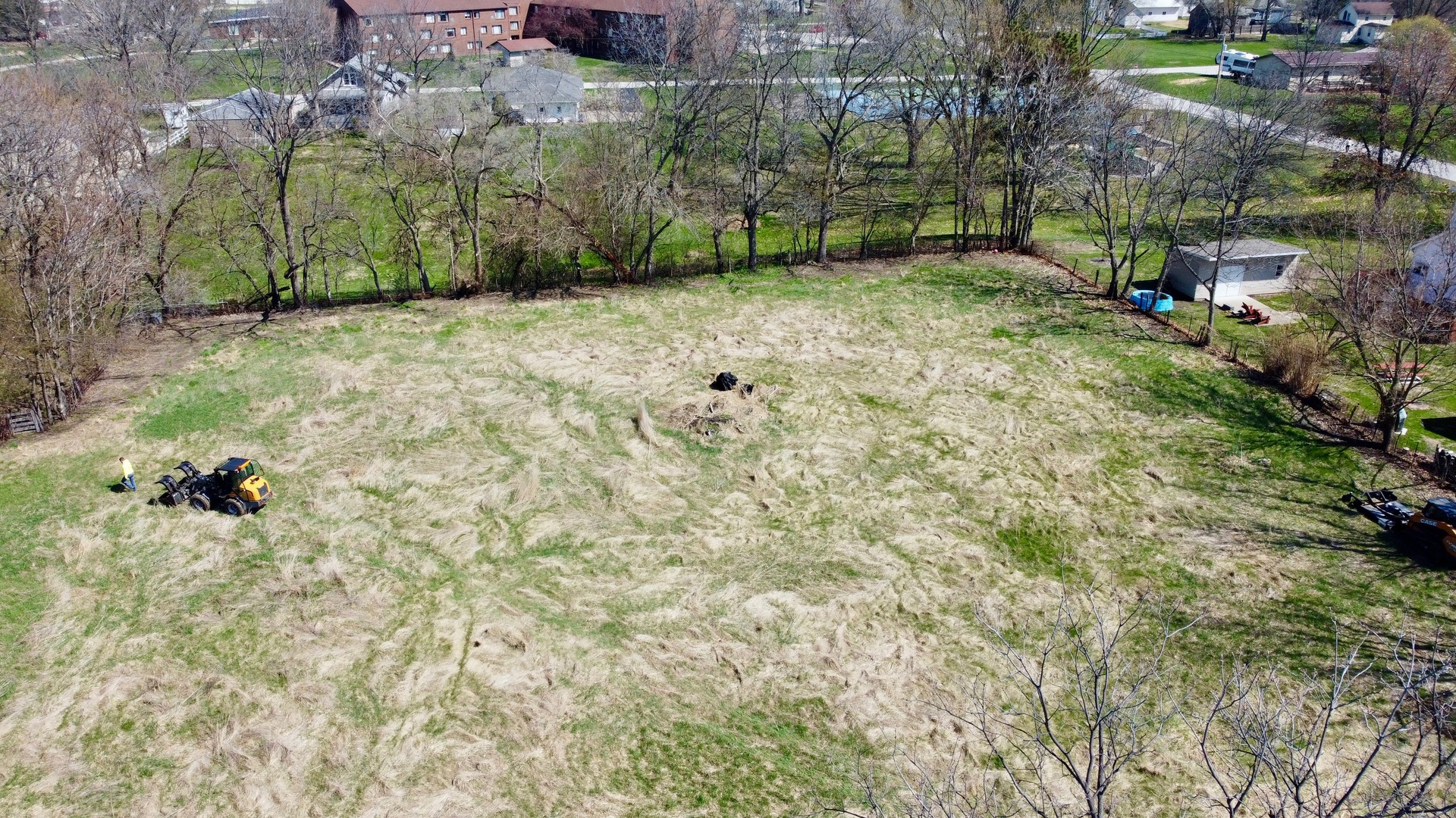 0 Northwest 7th Avenue Aledo, IL 61231 - Photo 6 of 8 a backyard of a house with lots of green space and trees