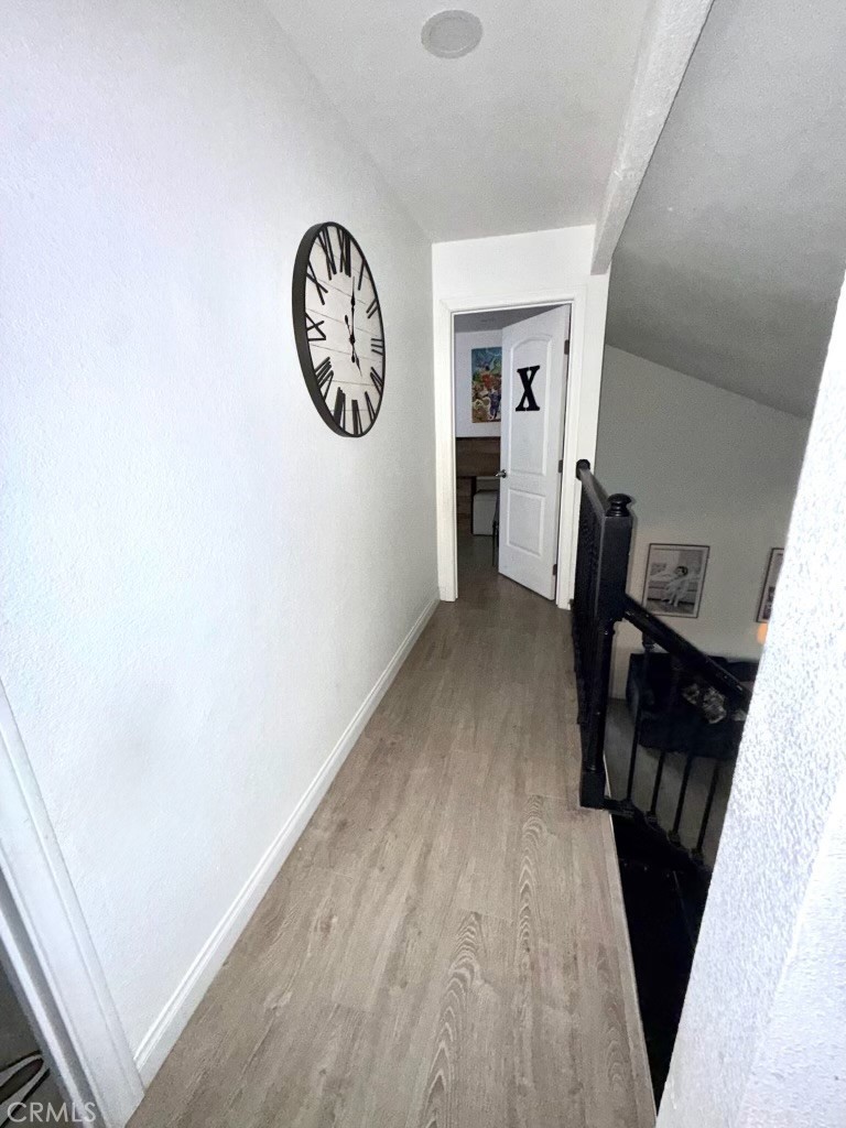 2606 North Palm Avenue Rialto, CA 92377 - Photo 15 of 29 a view of a hallway with a workspace