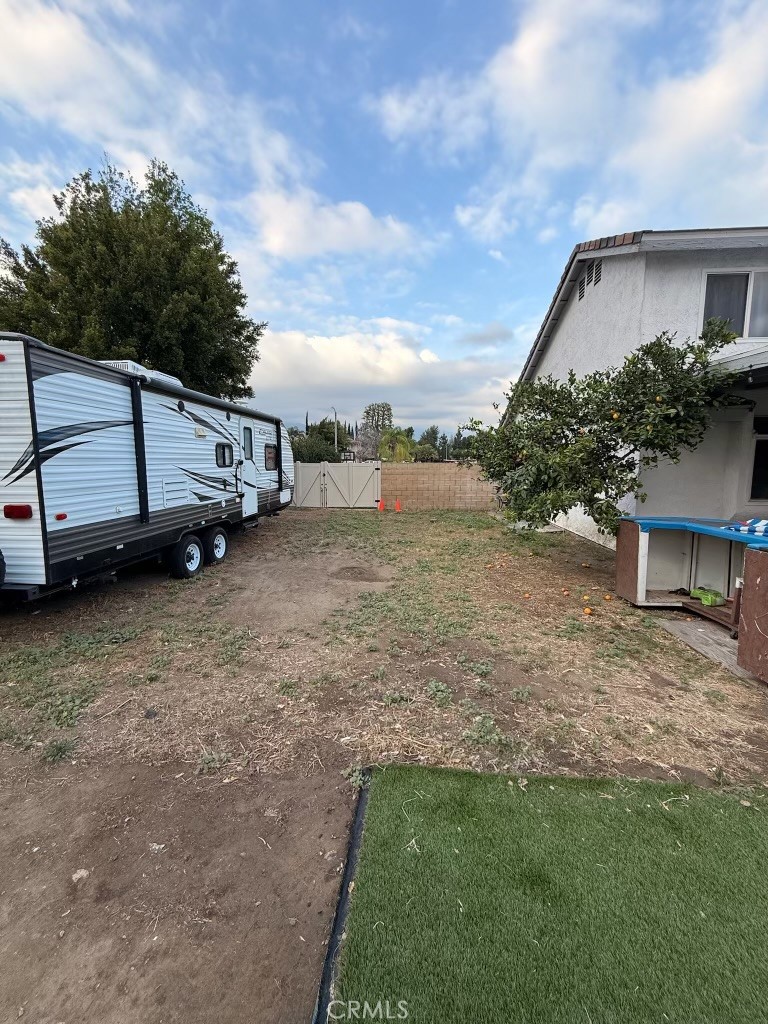 2606 North Palm Avenue Rialto, CA 92377 - Photo 19 of 29 a view of a house with backyard and trees