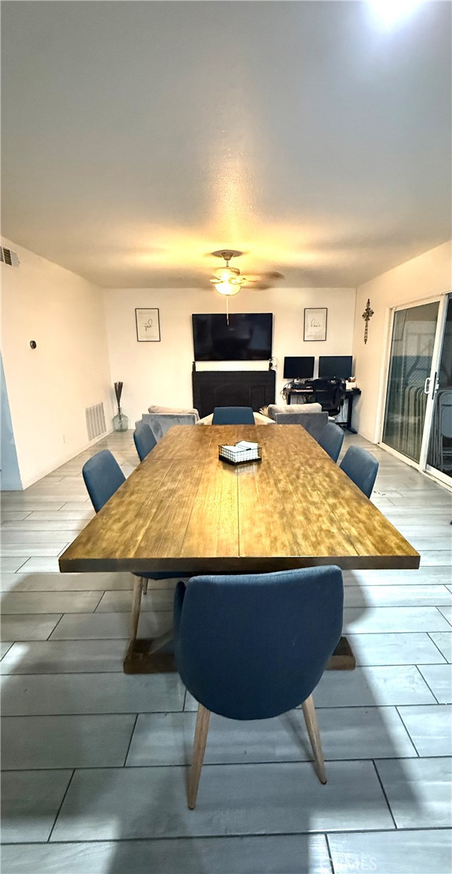 2606 North Palm Avenue Rialto, CA 92377 - Photo 24 of 29 a room with furniture and flat screen tv