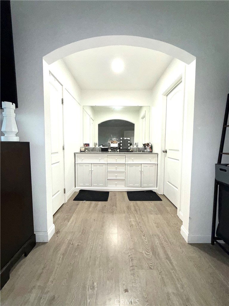 2606 North Palm Avenue Rialto, CA 92377 - Photo 4 of 29 a view of a kitchen with a sink stove cabinets and a kitchen