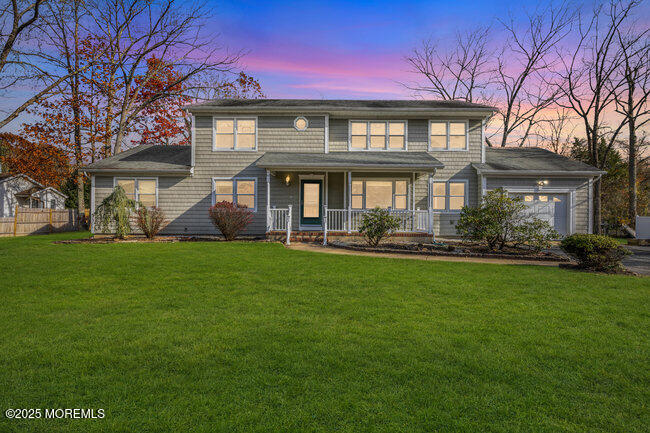 153 Cedar Swamp Road Jackson, NJ 08527 - Photo 1 of 21 a front view of house with yard and green space